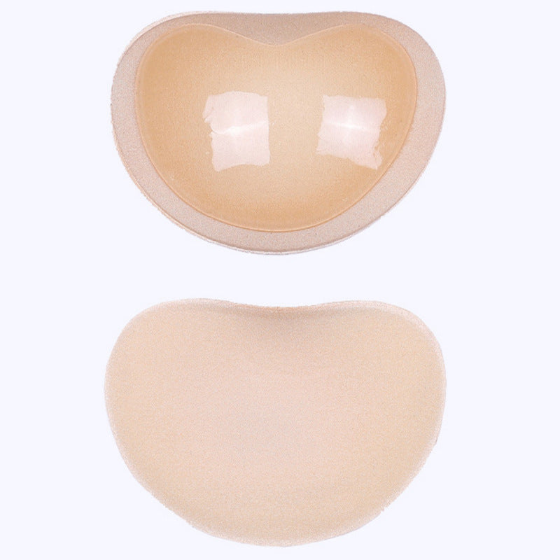 Push-up pads with adhesive silicone part