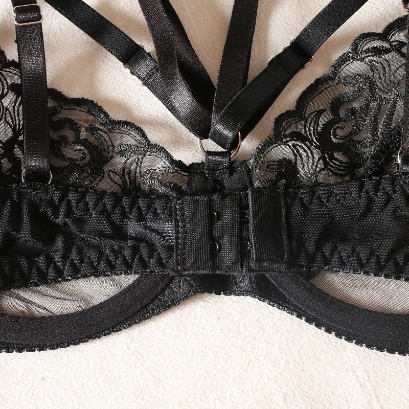 Lingerie set with a garter belt decorated with feathers.