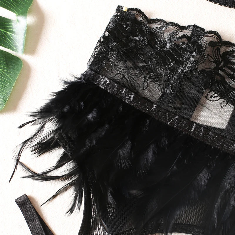 Lingerie set with a garter belt decorated with feathers.