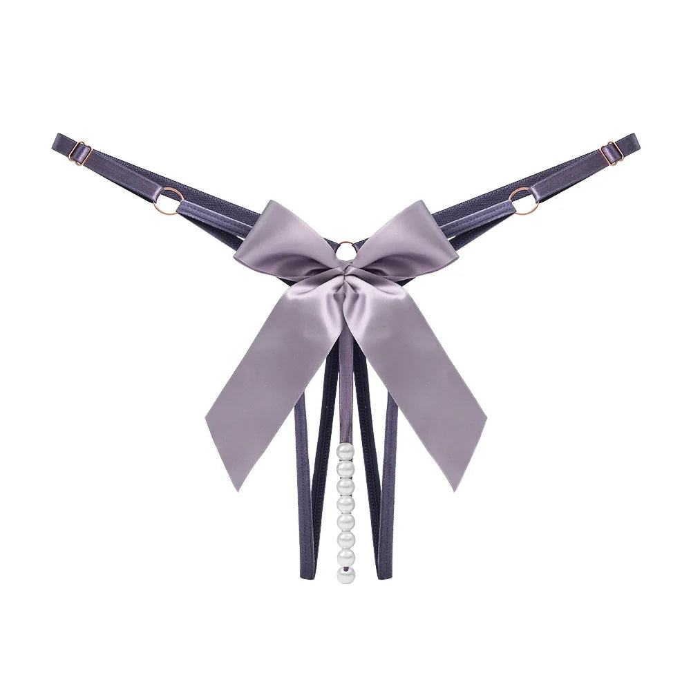 Thong with decorative pearls at the crotch