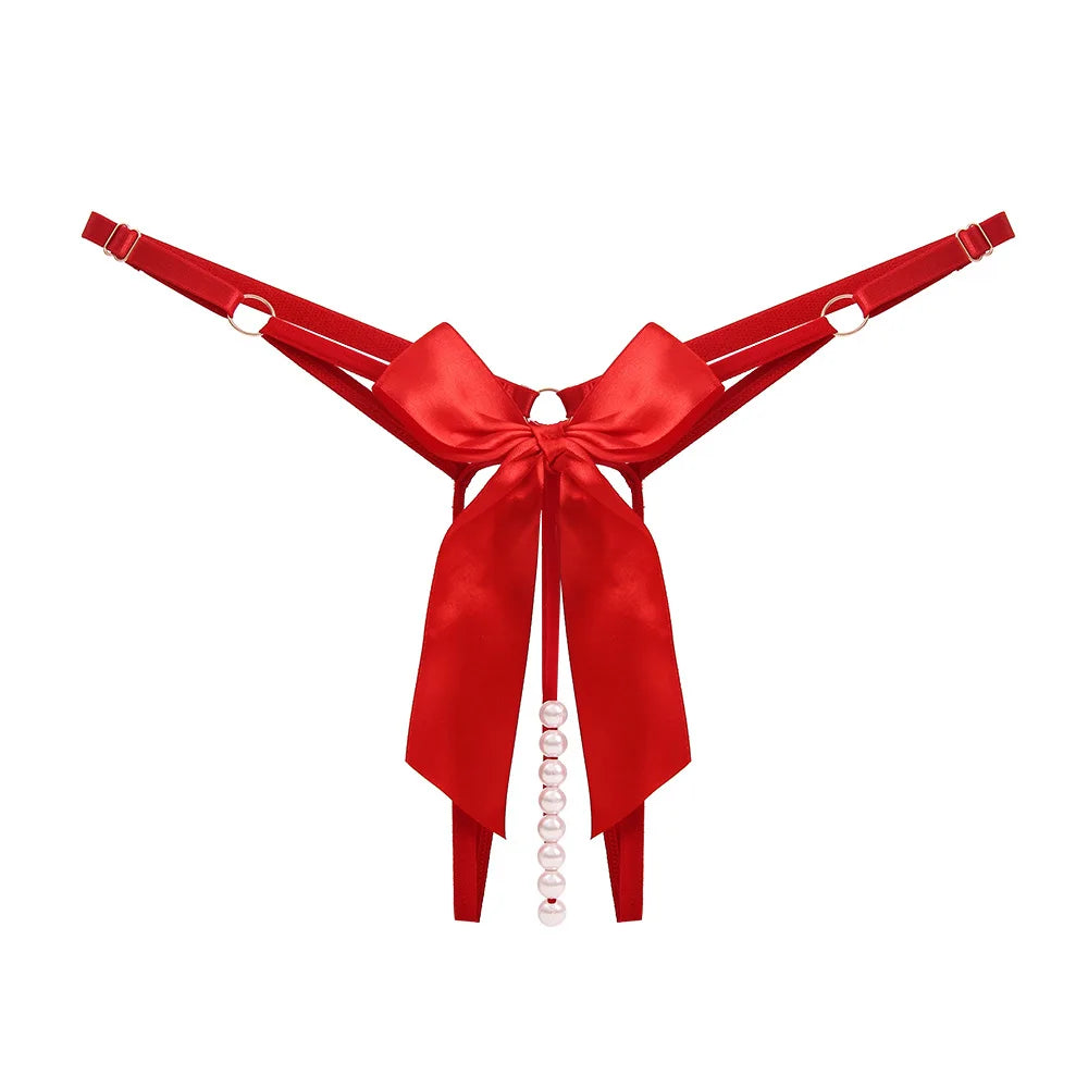 Thong with decorative pearls at the crotch