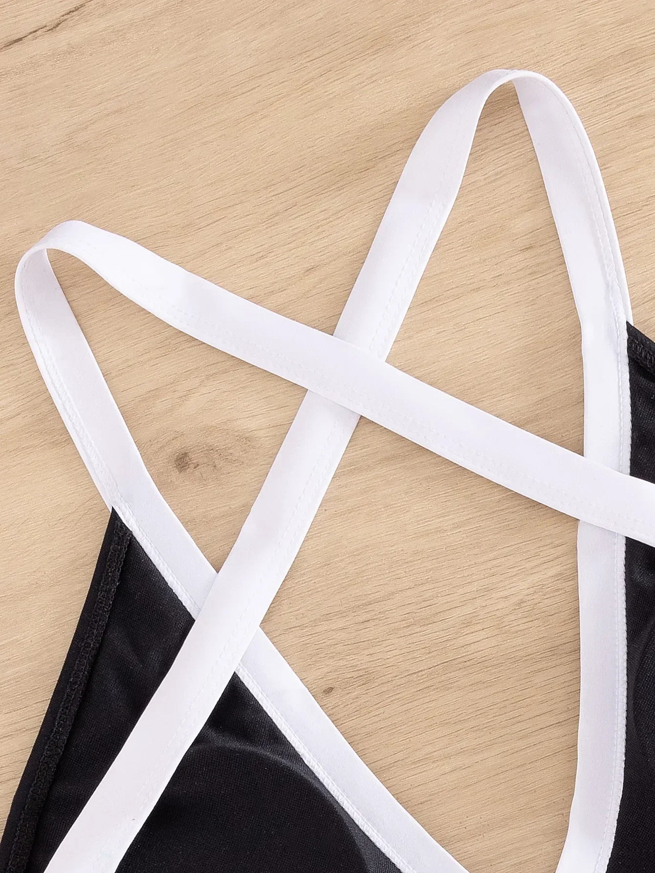 One-piece swimsuit with a plunging neckline