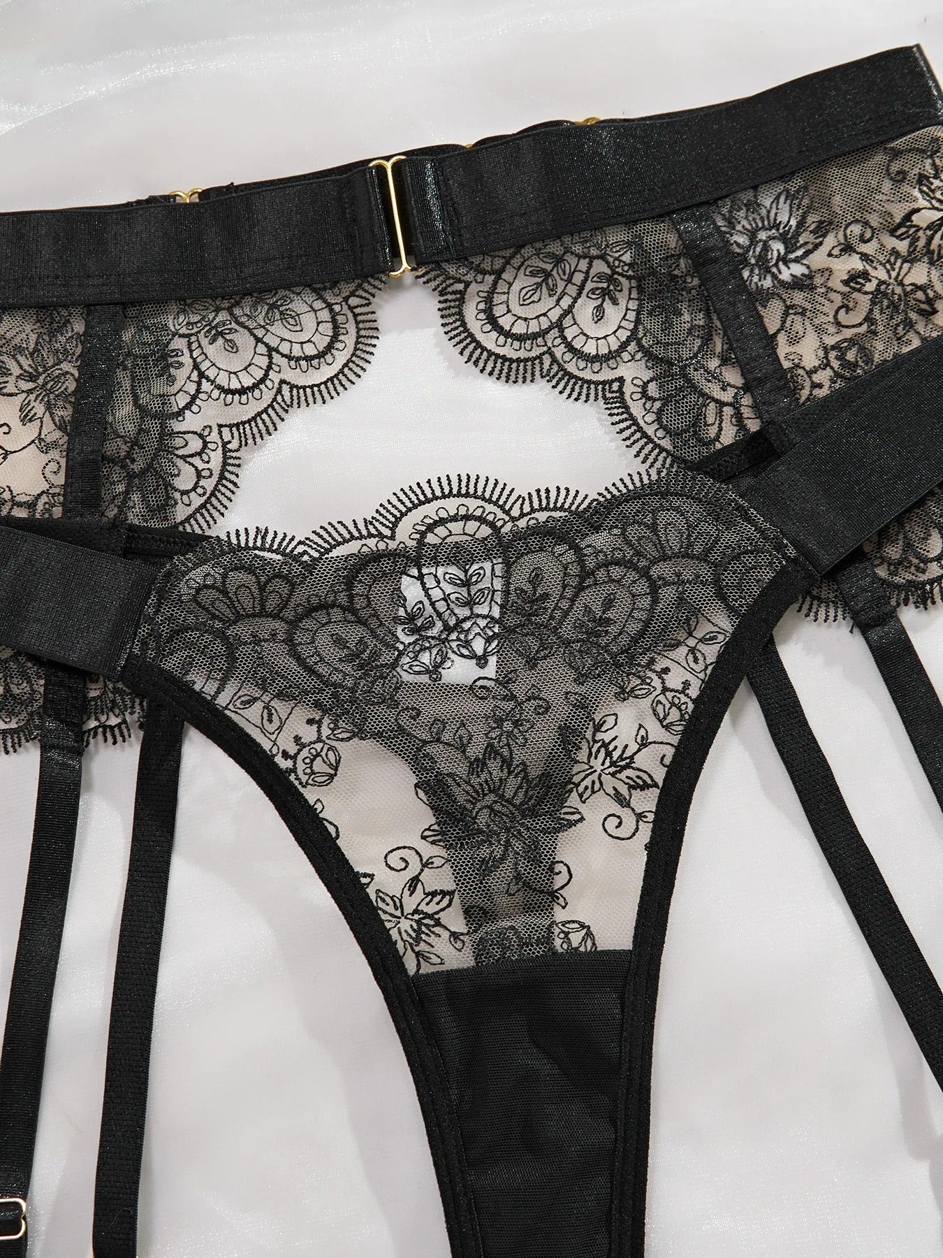 Lingerie set with garter belt and lace details